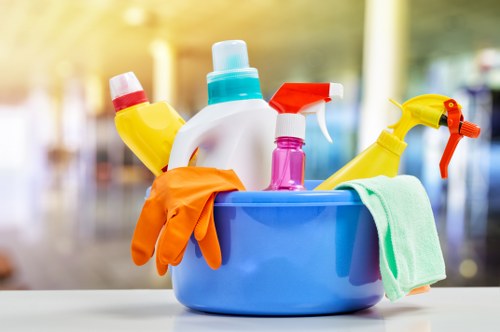 Cleaning team handling service paperwork and safety checks