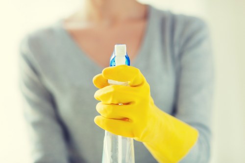 Office cleaning tasks in a modern SW20 business setting