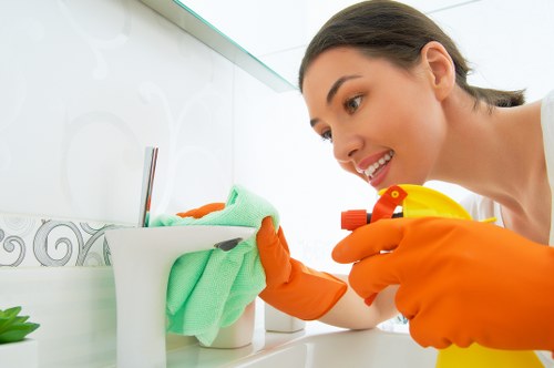 Professional carpet cleaner reviewing booking details before arrival