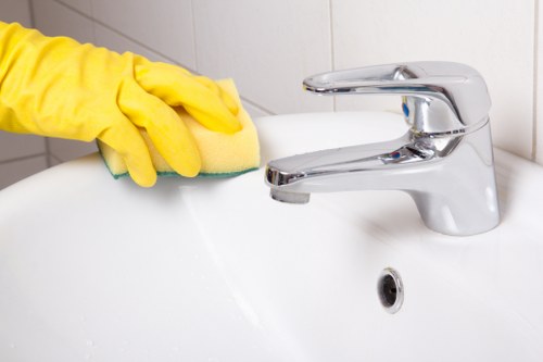 End of tenancy cleaner in SW20 preparing a property