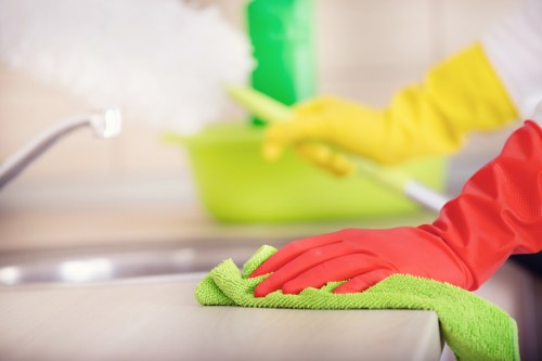 Cleaners managing equipment and safety on site